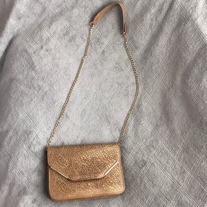 Brown shoulder bag with beautiful gold detail